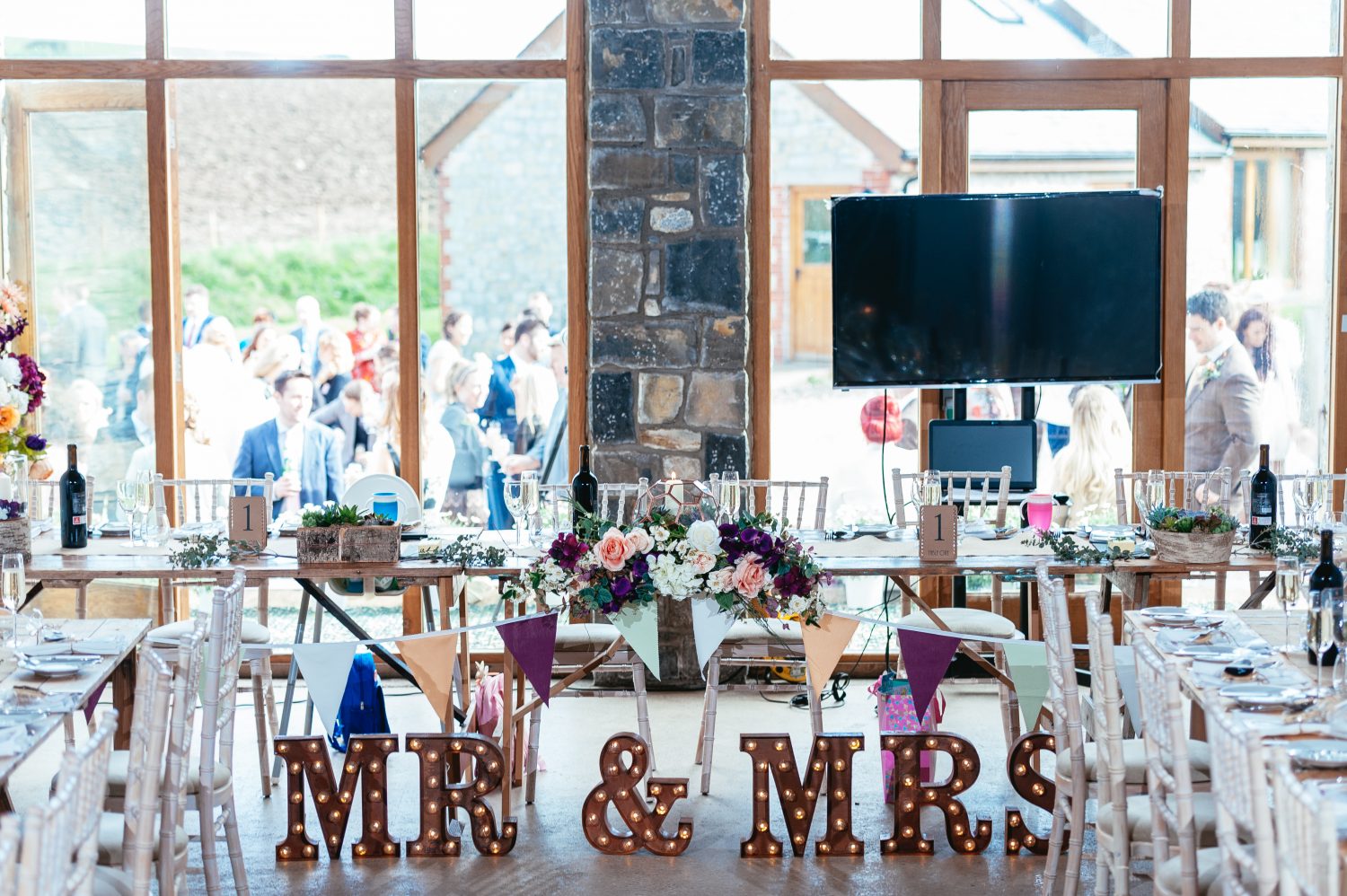 The Top Table Set up in the Farmer's Barn by South Wales Wedding Photographers