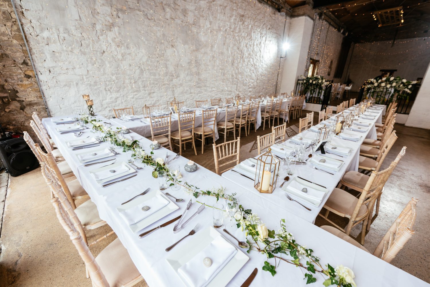 Trestle Table Set up in the Farmer's Barn by South Wales Wedding Photographers