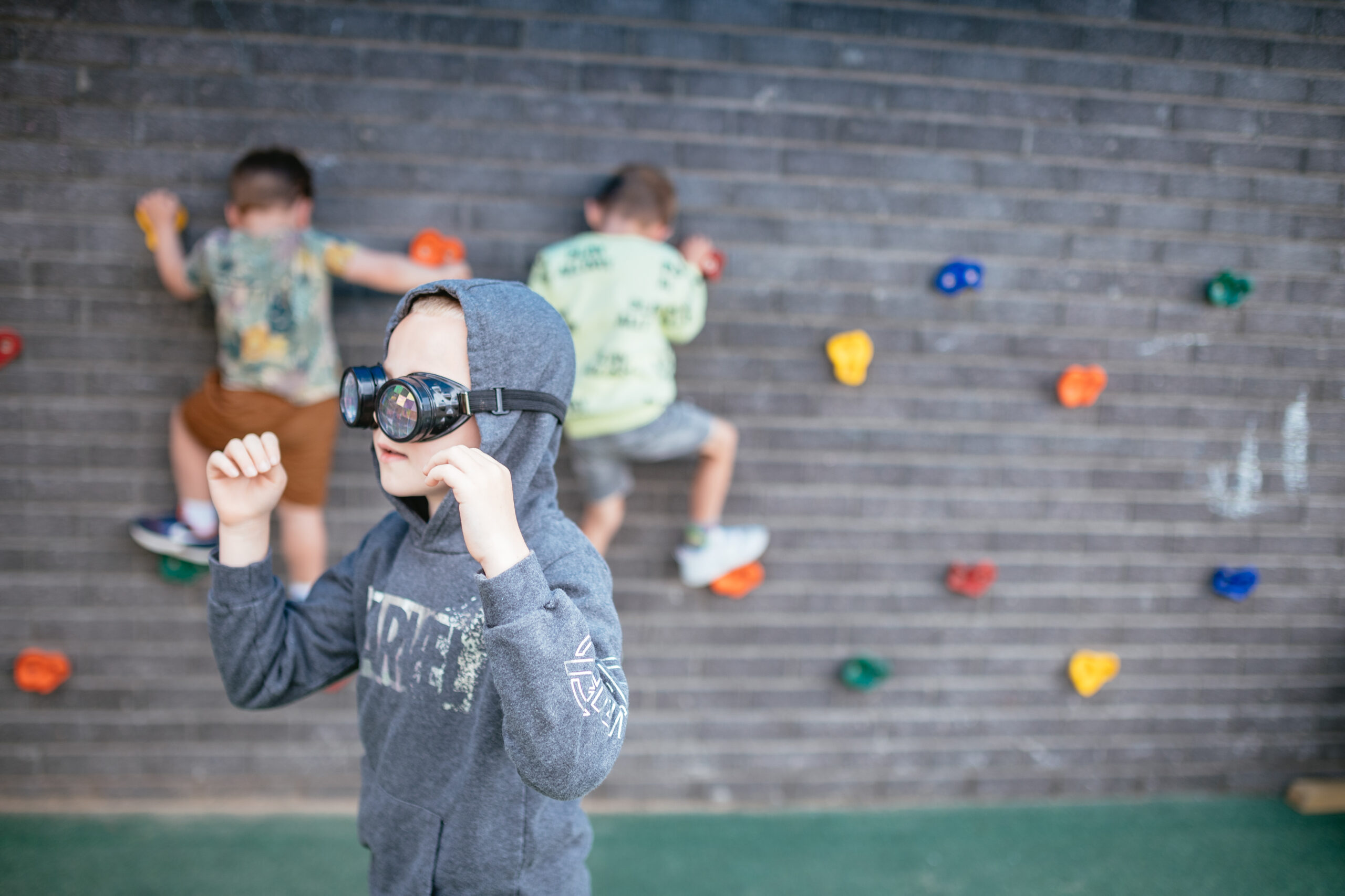 young child wearing goggles