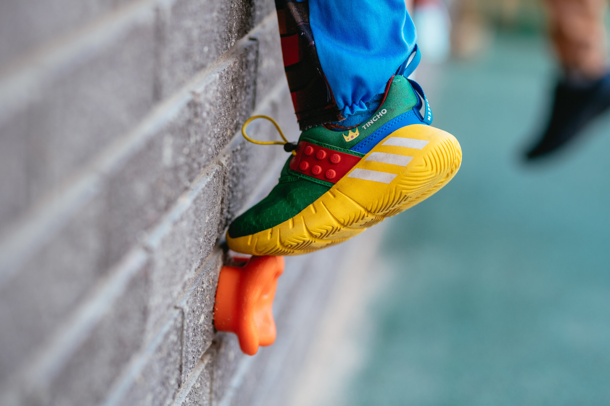foot on a climbing wall